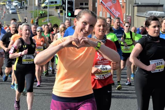 Runner No 971, Iwona is loving the Larne Half-Marathon. INLT 11-004-PSB