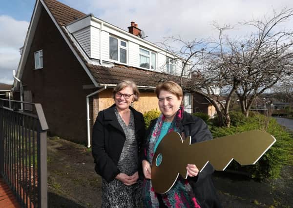 Tracy Meharg, permanent secretary of the Department for Communities (DfC), has handed the keys of 59 former MOD homes at Mountview Drive and Skyline Drive, Lisburn to Clare McCarty from Clanmil Housing. Clanmil will refurbish them into 30 social homes for families on the social housing waiting list and 29 affordable homes for sale to those wanting to get on the property ladder.