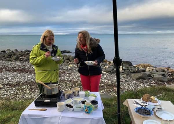Gillian Thompson, from Irish Seaweed Company and Louise Gostelow cook up a treat at the seafront.