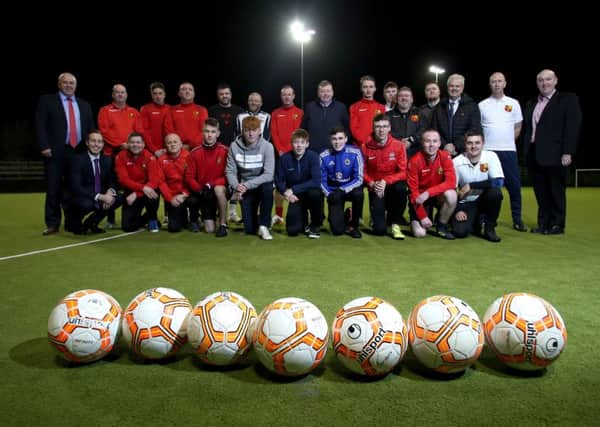 Alderman Paul Porter, Chairman of the Council's Leisure & Community Development Committee is pictured with Broomhedge Maghaberry Football Club and elected representatives for the area.