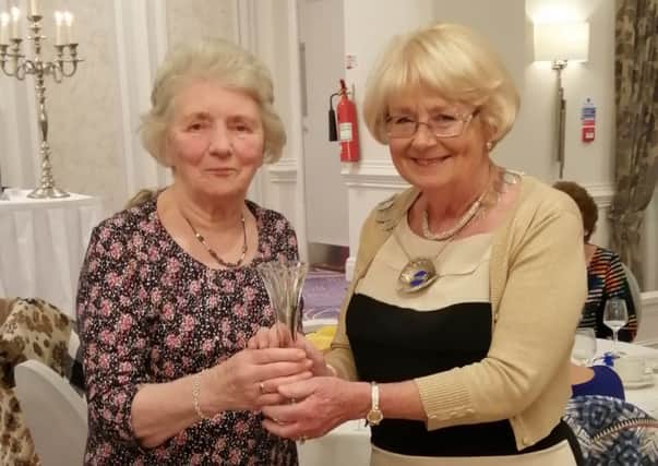 Collette Craig Federation Chairman presents Ahoghill WI's  Mary Kernohan with 60th anniversary Vase for runner up in competitions.