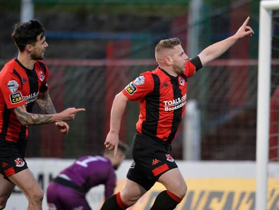 David Cushley celebrates after putting Crusaders in front from the spot