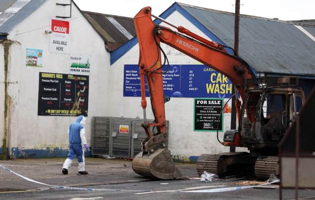 A digger, which had been stolen from a nearby site, was used in the raid at the Nisa shop on Brook Street in Ahoghill. Pic: Matt Mackey /   Press Eye