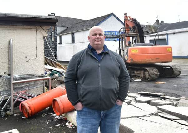 Shop Owner Walter Miller at the scene following the theft of an ATM machine from his shop in Ahoghill.

 
Photo: Colm Lenaghan/Pacemaker Press
