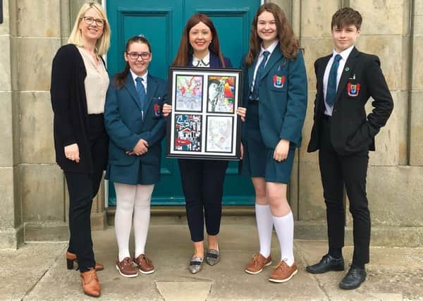 Pictured at the unveiling of the final piece of artwork are Olga Casey, Banbridge Academy's Head of Art and Design; Anna Doyle; Victoria Poole, EA Communications and Engagement Officer; Katie Wright; and Conor Doyle.