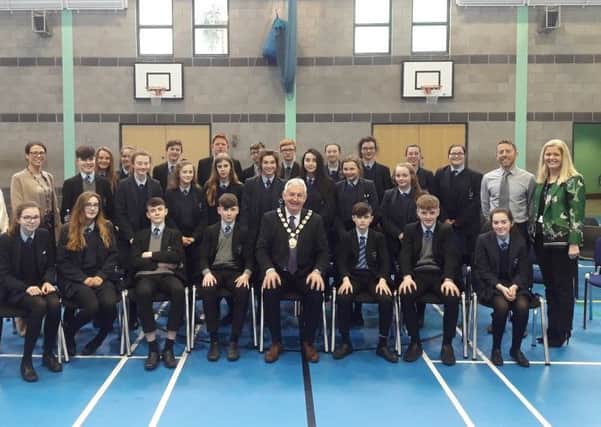Chair of Mid Ulster District Council, Councillor Sean McPeake pictured with Council officers, pupils and staff from St. Patricks College, Maghera Primary School and St. Marys Glenview Primary School at the recent Maghera Public Realm Information Session.