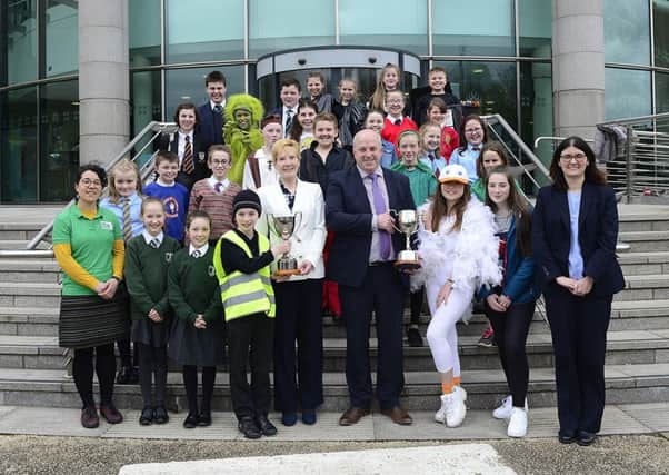 All the participants in the 2019 Environmental Youth Speak from schools across the Lisburn Castlereagh area are pictured with Councillor Janet Gray MBE, Chair of the Council's Environmental Services Committee; Alderman James Tinsley, Vice-Chair of the Environmental Services Committee and Noeleen O'Malley, Waste Policy & Development Manager.