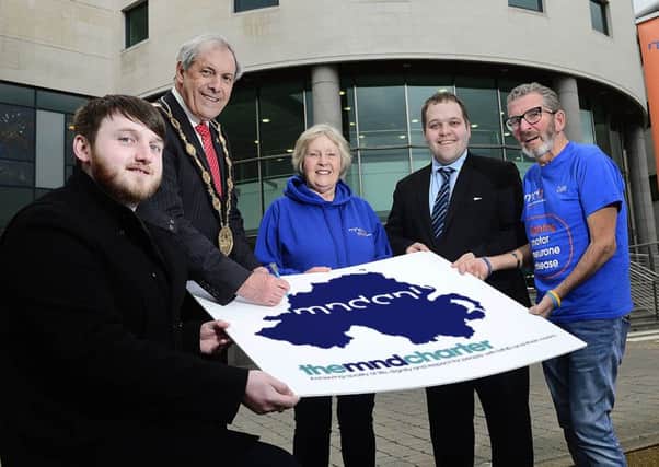 Councillor Aaron McIntyre; The Mayor, Councillor Uel Mackin; Marie Holmes, MNDANI Branch Secretary; Councillor Nathan Anderson, Chair of the Corporate Services Committee and Colm Davis OBE, MNDANI Campaigns Volunteer.
