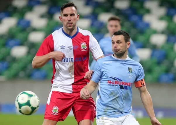 Linfield's Andrew Waterworth (left) with Ballymena's Jim Ervin