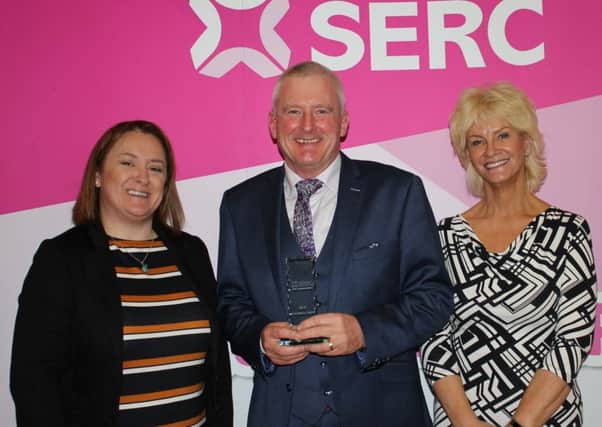 Robin Hamill - Aico - received an award for providing 'Support for SERC Students and Apprentices with Placements or Employment'. He is pictured with Karen Fraser, SERC Board of Governors and Guest Speaker Monica McCard from Lisburn