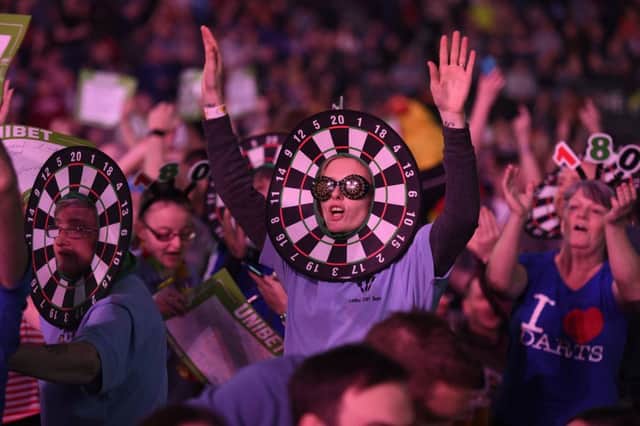 4/4/19: Fans at the match between James Wade and Mensur Suljovic during the Unibet Premier League Darts at the SSE Arena, Belfast. Picture: Michael Cooper