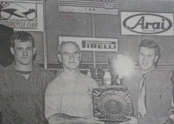 Frank Corrigan accepts an award on behalf of the Enkalon Club for their support towards the Clubman's Series over the years. The award was presented by the 1997 Champions. 1997