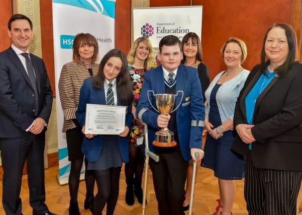Principal, Máire Thompson, attended the event alongside Year 10 students Drusilla Larkin and Lee McCoy and other staff members to receive the award from Permanent Secretary Mr Derek Baker.