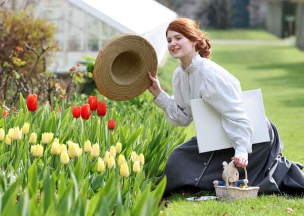 Getting ready for a visit from the official Peter Rabbit(TM) at the 12th  annual Tulip Festival,  May  4-6 at Glenarm Castle was Sophie Murphy, in a style reminiscent of Beatrix Potter; illustrator, botanist and author of the world famous Peter Rabbit stories. Pic: Paul Faith