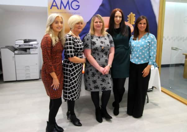 The staff from AMG pictured at the official opening of the new office
