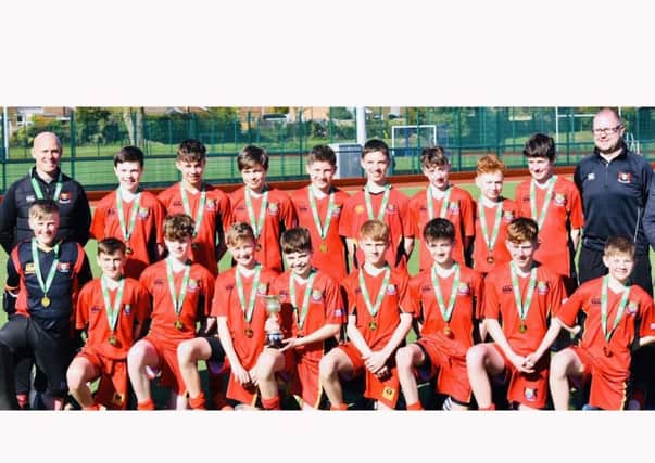Banbridge Academy with the John Waring Cup as under 14s' All-Ireland champions.