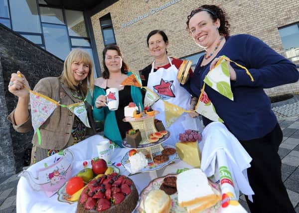 Pictured left to right are; Julie Cusick, Promotions Officer at Volunteer Now, Grainne McCloskey from The Big Lunch, Mary Caldwell, Chair of Armagh Child Contact Centre and Christine Hall, Area Co-ordinator for Childline Schools Service
