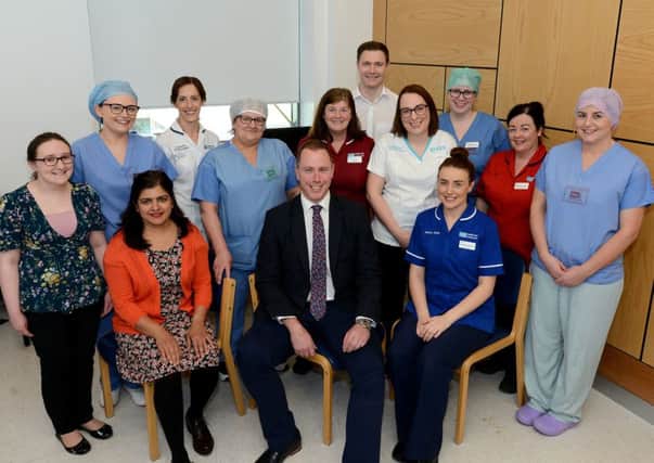 Gavin McLean (front centre) pictured with the Southern Trust multidisciplinary Team consisting of  Trauma and Orthopaedic Consultants, Anaesthetic Consultants and Registrar, Orthopaedic Theatre and Ward Nursing Staff, Clinical Orthopaedic Outcome Practitioner, Pre-op, Pharmacy and Physiotherapy staff, Pain Management Nurse.