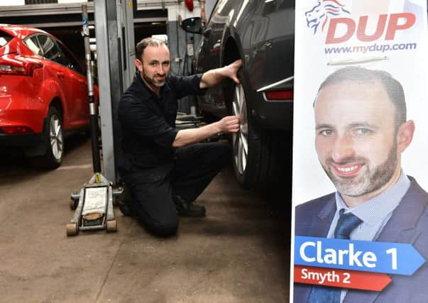 Andrew Clarke pictured in his family business, Clarke's Tyres, in Larne. Pic: Colm Lenaghan/Pacemaker