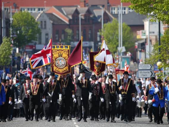 Apprentice Boys of Derry Easter Monday parade in Belfast.  The main parade makes its way up the Holywood Road in east Belfast where it stopped on the Belmont Road for a religious service at a war memorial before carrying on.