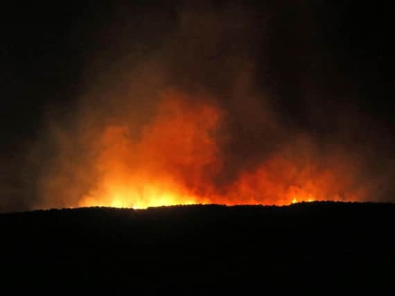 A fire rages across the Slievenorra Mountain near Cushendall on Monday night. Pic Steven McAuley/McAuley Multimedia