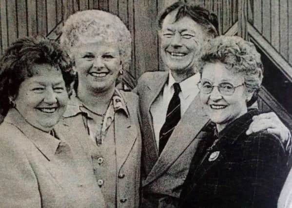 Templepatrick Action Cancer Group raised £5,000 in four weeks. Displaying their cheque are Betty Campbell, Catherine Michael, Rev McConnell Auld,Yvonne Lyons, Grace Coleman and Kay Logan. 1997