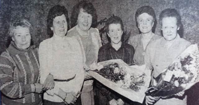 Some of the staff of Regatta Fashions, Cloughmills, who attended a social evening in the Fort Royal to mark the retirement of Matty Herbison after 41 years' service. 1989.