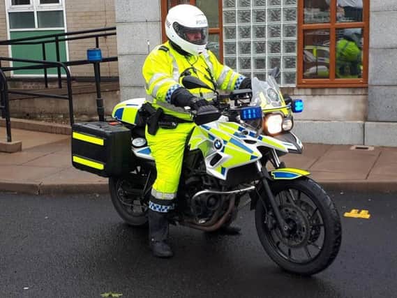 Officer prepares to carry out duties at today's Cookstown 100.
