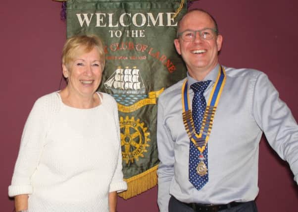 Michael Thompson, president of Rotary Club of Larne, welcomed Dr. Muriel Hill, of the Ulster History Circle.