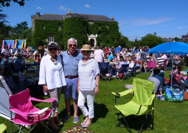 Rosie McEvoy and Bill and Dee McKitterick pictured enjoying The Big Lunch Templepatrick last year.