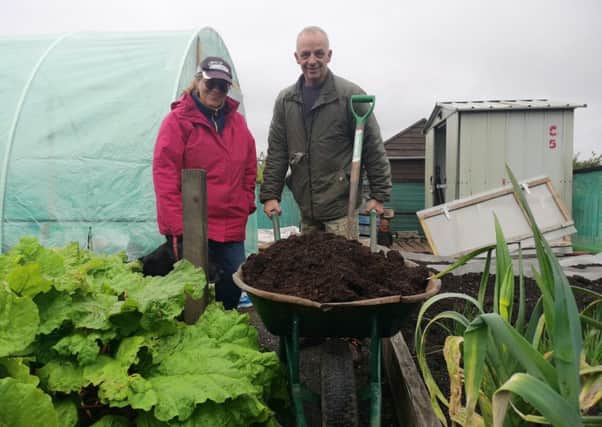 Matt Crockard and Rachel McKee promote Mid and East Antrim Borough Council's Compost Week.