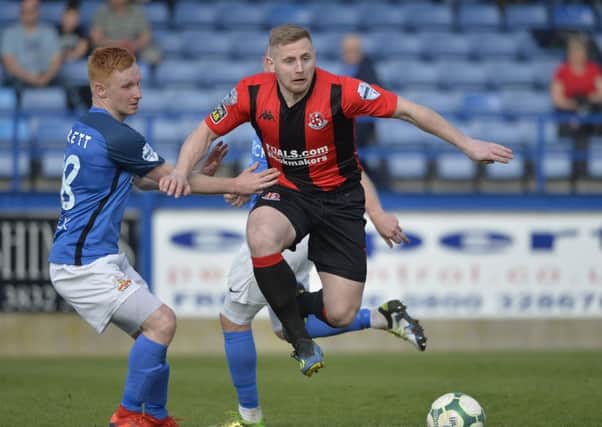 Crusaders David Cushley
 on the attack against Glenavon