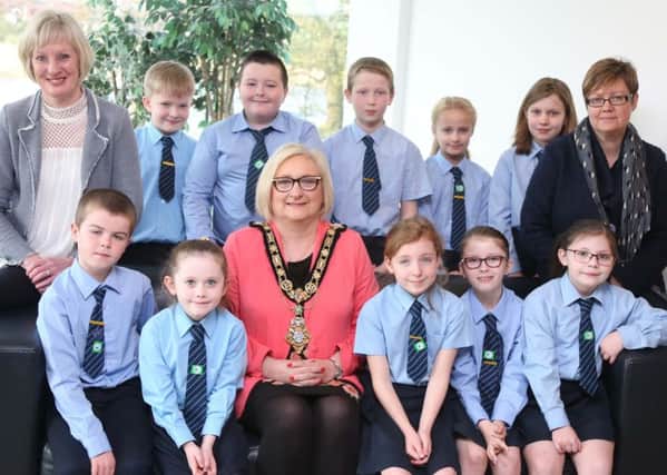 The Mayor of Causeway Coast and Glens Borough Council Councillor Brenda Chivers pictured with pupils from Kilrea Primary School;  ECO Schools co-ordinator Claire Anderson and Principal Karen Stinston at a civic reception in Cloonavin. ivic reception for Kilrea Primary School to mark Green Flag success. Kilrea PS became the first school in Northern Ireland to win ten Green Flags through the Eco-Schools initiative.