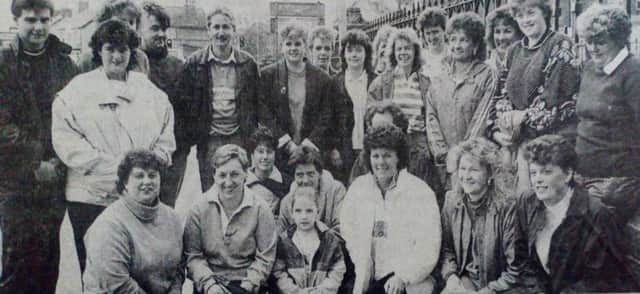 Morton and Simpson's staff and friends about to leave on their 10 mile sponsored walk in aid of the George Sloan Centre. 1989.