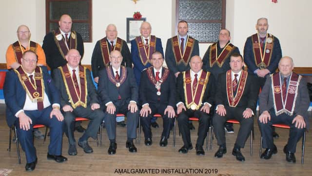 Pictured at the Antrim/Ballymena Amalgamated installation are Sir Knights and officers of the General Committee. Included is Bro Jen Kerr who presented former Governor Bro Jim Brownlee with a plaque for 10 years' service. (Submitted Pic.)
