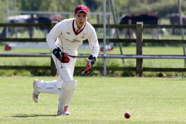 Banbury wicket keeper Alistair Short races after the ball at Cropredy