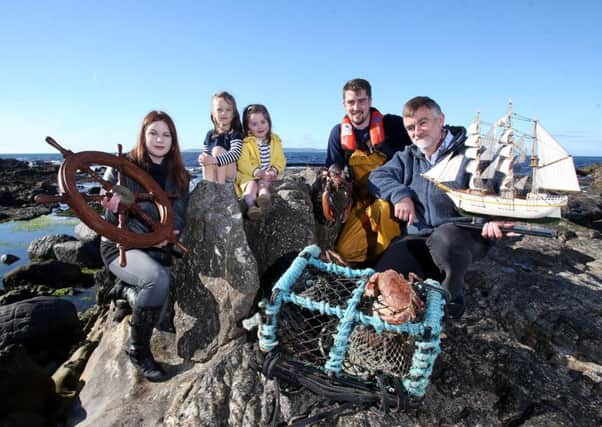 Shauna McFall from Naturally North Coast and Glens Artisan Market, Deputy Harbour Master Cary Aston, David Quinny Mee from Rathlin Community Development Association along with Sofia McAuley and Éibhleann Bailey are looking forward to the return of Rathlin Sound Maritime Festival which takes place from May 24 - June 2. PICTURE STEVEN MCAULEY/MCAULEY MULTIMEDIA
