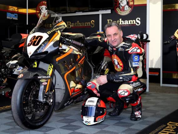 Michael Rutter with the Bathams/Aspir-Ho Honda RC213V-S he will race in the Superbike class at the North West 200.