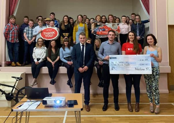 Holestone YFC raised £13,000 for Air Ambulance NI with the help and support of past, present members and wider community throughout the past year with a variety of different events.