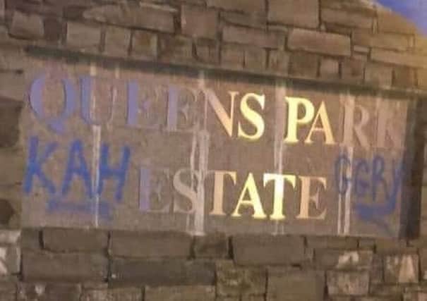 Graffiti painted at the entrance to the estate has been removed.