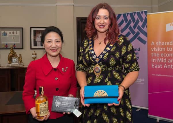 Madame Meifang Zhang was presented with a bespoke brooch designed by local jewellery artisan, Vera McCullough, and a gift pack specially commissioned by Crosskeys whiskey.