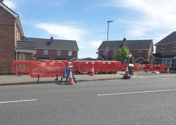 Virgin Media contractors carrying out work on Tuesday lunchtime at Gilpins Mews off the Old Portadown Road, Lurgan