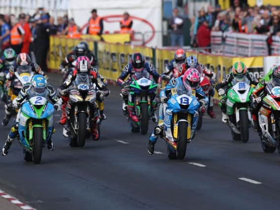 Riders pictured at the start of Thursday evening's opening Tides Restaurant Supersport race at the North West 200. Lee Johnston (13) won the race Photo Stephen Davison/Pacemaker Press