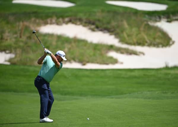 Graeme McDowell of Northern Ireland plays a shot on the fourth hole during the 2019 PGA Championship at Bethpage