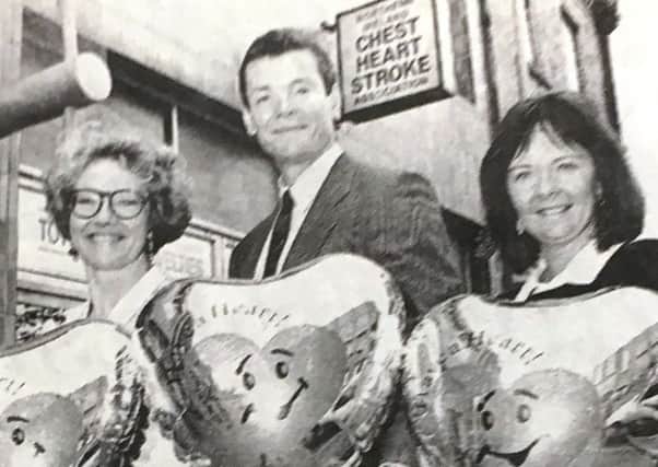 Wendy Austin, Dr Colin Boreham and Laura Quinn, the NI Chest Heart and Stroke appeals coordinator for Armagh celebrate the annual Have a Heart Appeal in 1993
