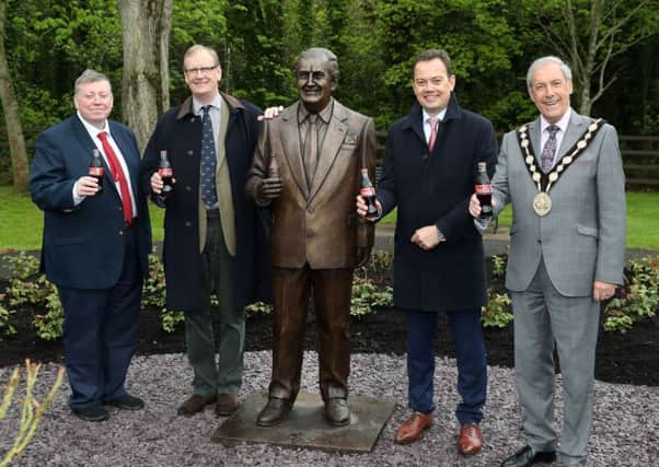 Pictured at the unveiling of a statue to honour the late Mr Terence Robinson are (L-R) Alderman Paul Porter, Tim Robinson, Matthieu Seguin, General Manager of Coca-Cola HBC Ireland & Northern Ireland and Mayor of Lisburn & Castlereagh City Council, Councillor Uel Mackin