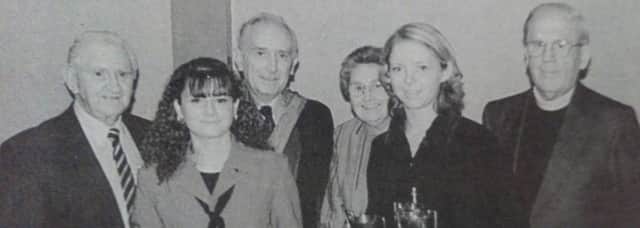 Shelly Crawford and Lynsey McWatters receive top A Level Prizes from Rev and Mrs Brown and Mr and Mrs Raymond King at Monkstown Community School prizegiving. 1997