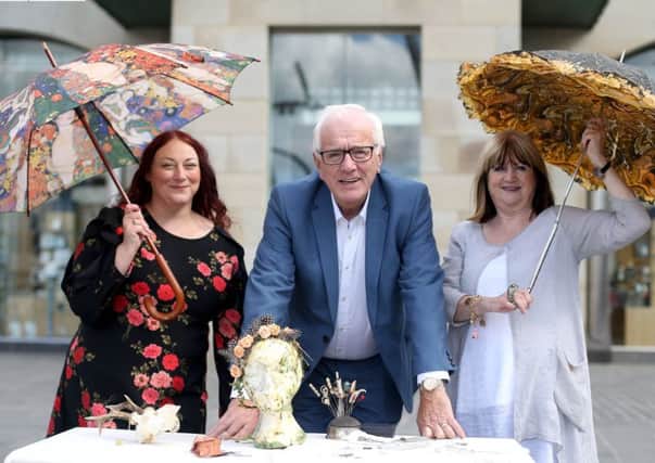 Alderman Allan Ewart MBE, Chairman of the council's Development Committee promotes the upcoming Midsummer Craft In The City event taking place on Saturday 1st June with Julie Warrington and Norma Smallwood, Event Managers.