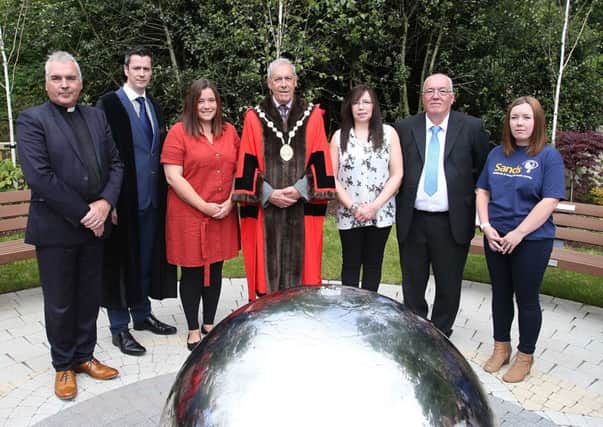 Rev. Paul Jamieson; David Burns, Chief Executive Lisburn & Castlereagh City Council; The Right Worshipful The Mayor, Councillor Uel Mackin; Laura Dooley SANDS and members of the Kirkwood family pictured at the Garden of Reflection at Lagan Valley Island, Lisburn, which was officially opened on the 23rd May for residents who have been affected by the loss of a child.