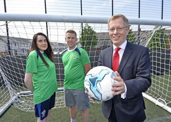 Mark Graham, Chief Executive at Co-Ownership, pictured with Catrina Sheehan and Gavin Martin from Street Soccer NI, the organisation that was awarded the Community Fund last year.